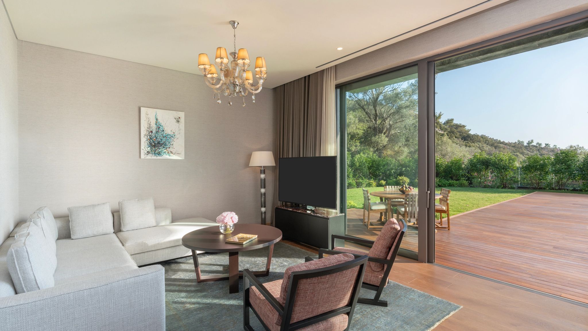 Arya Villa sala de tv - sala de estar - varanda privativa