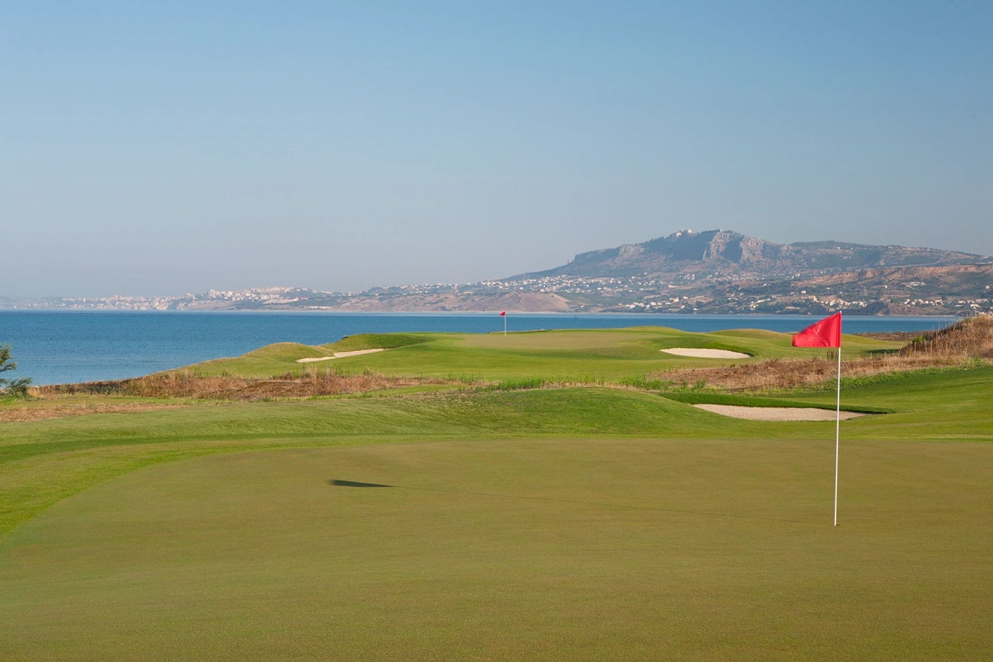 aula de golf – esporte ao ar livre - campo de golfe - golfe beira mar - golfe profissional