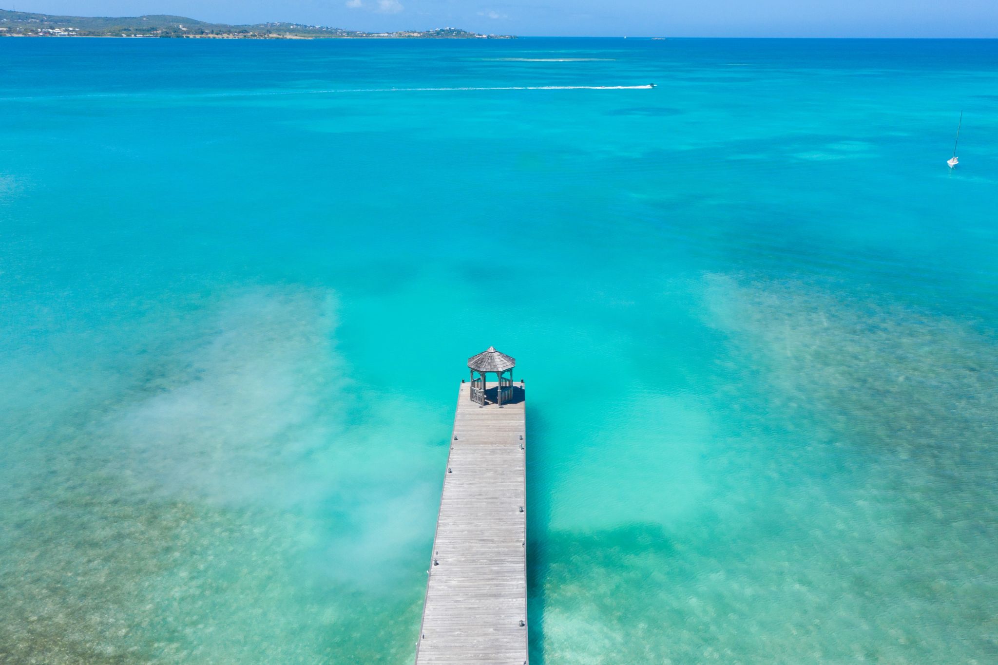 Praia do resort Jumby Bay Island mar do caribe - mar azul turquesa - aguas cristalinas - ferias de verao - beleza natural