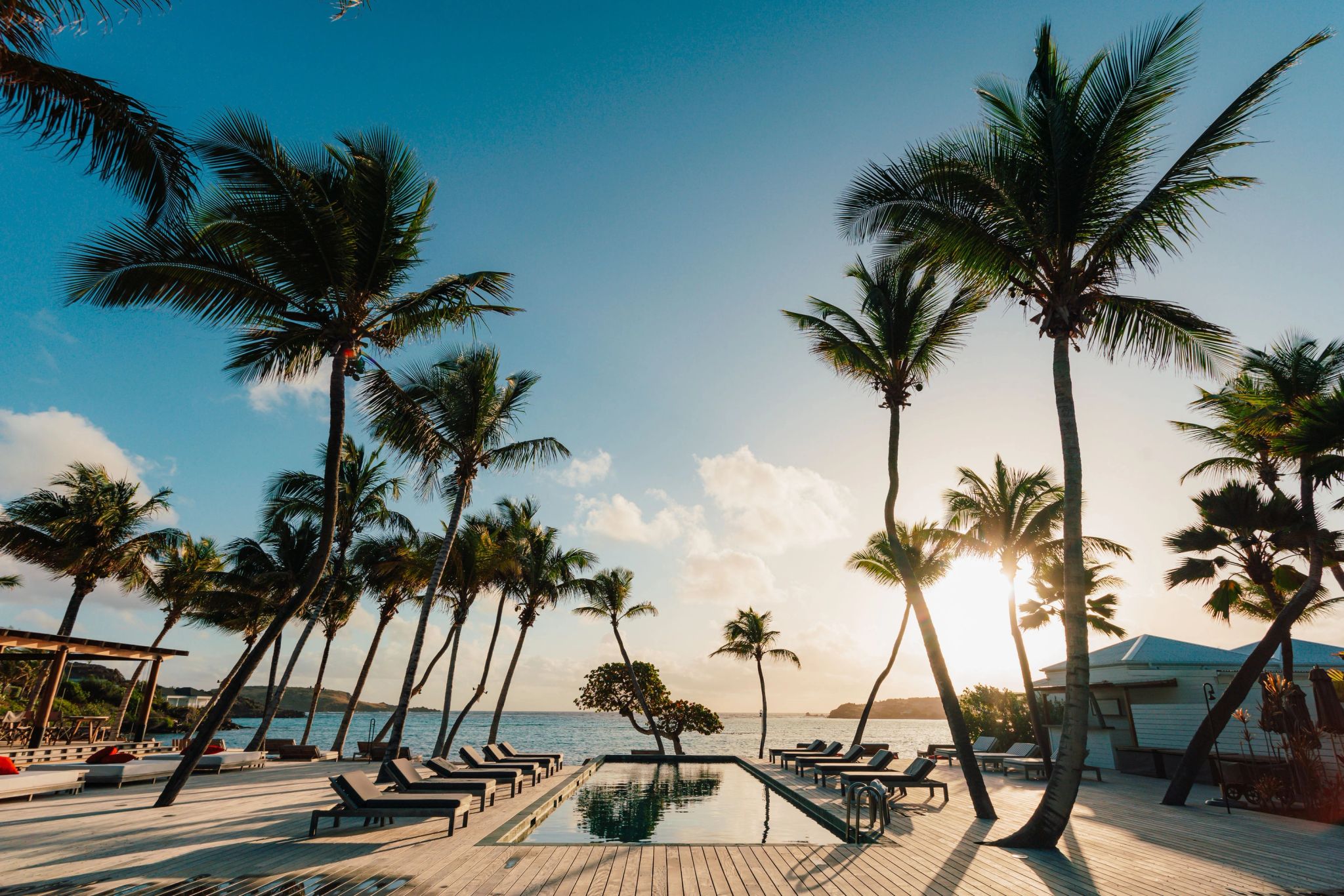 Piscina do resort Le Sereno St Barth por do sol - piscina vista mar - hotel frente mar - resort no caribe