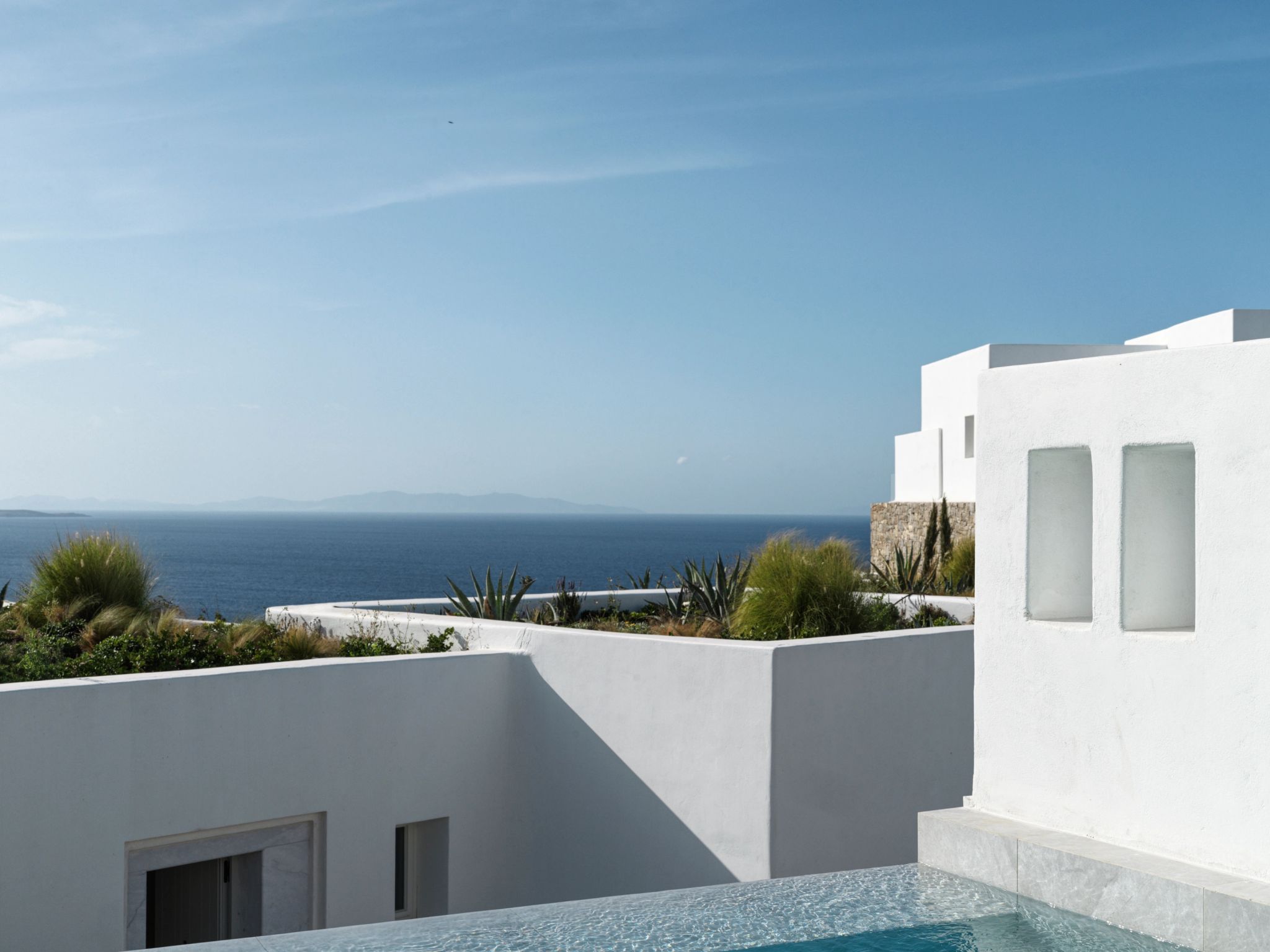 Beta Suite varanda privativa - vista para o mar egeu - terraco com piscina