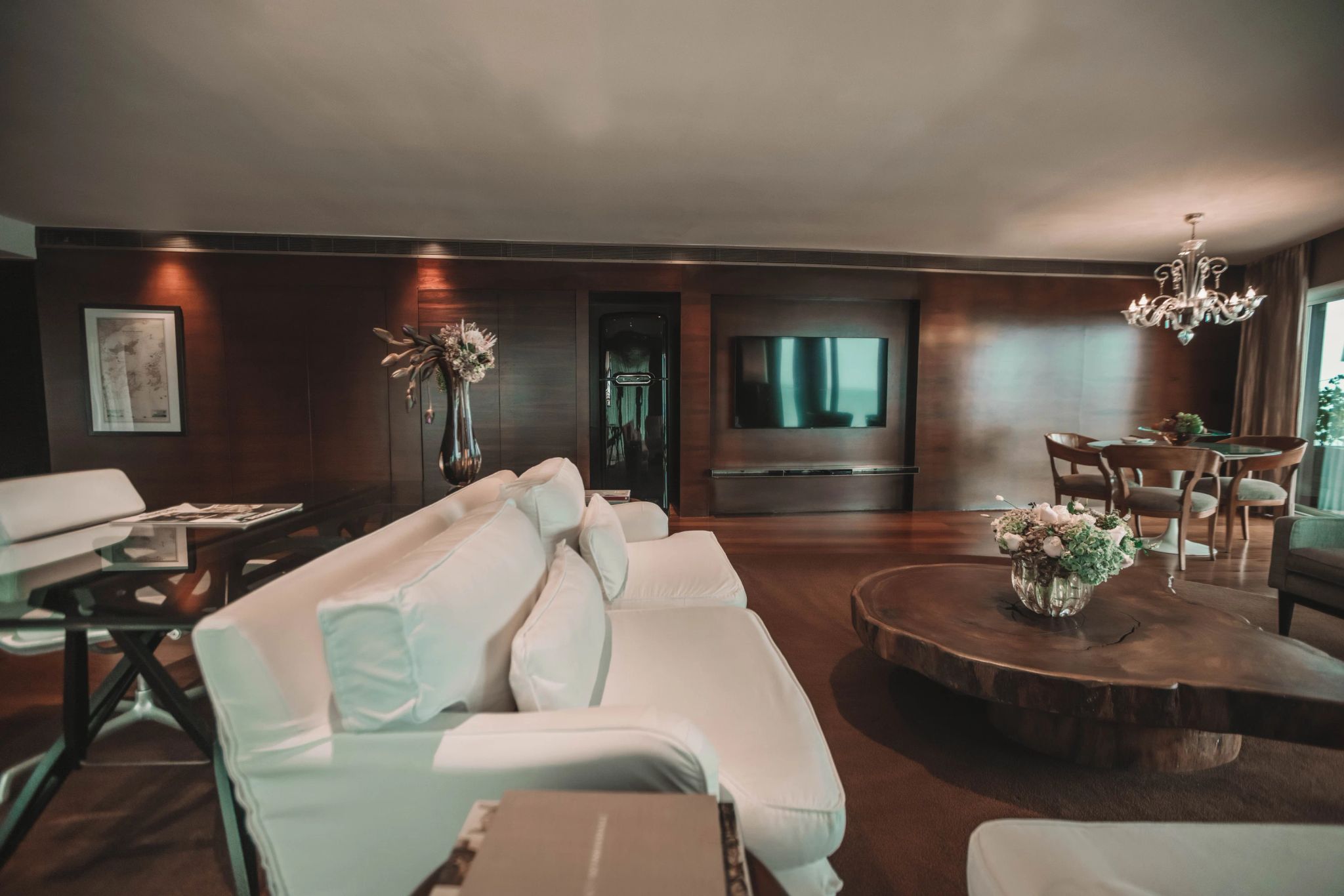 sofa confortavel de hotel - suite deluxe - fasano