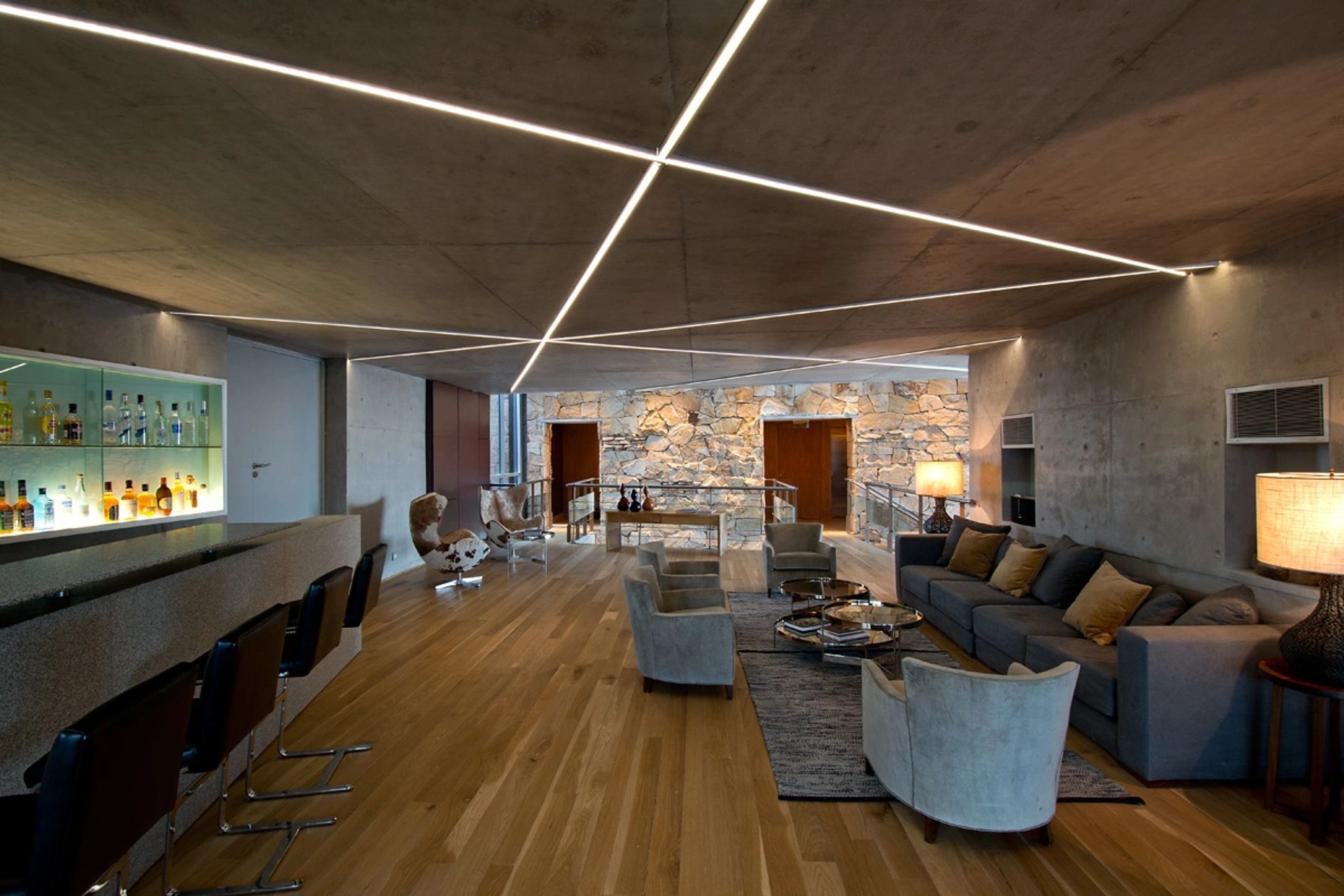 Sala do Hotel living moderno com sofás aconchegantes no resort casa de uco