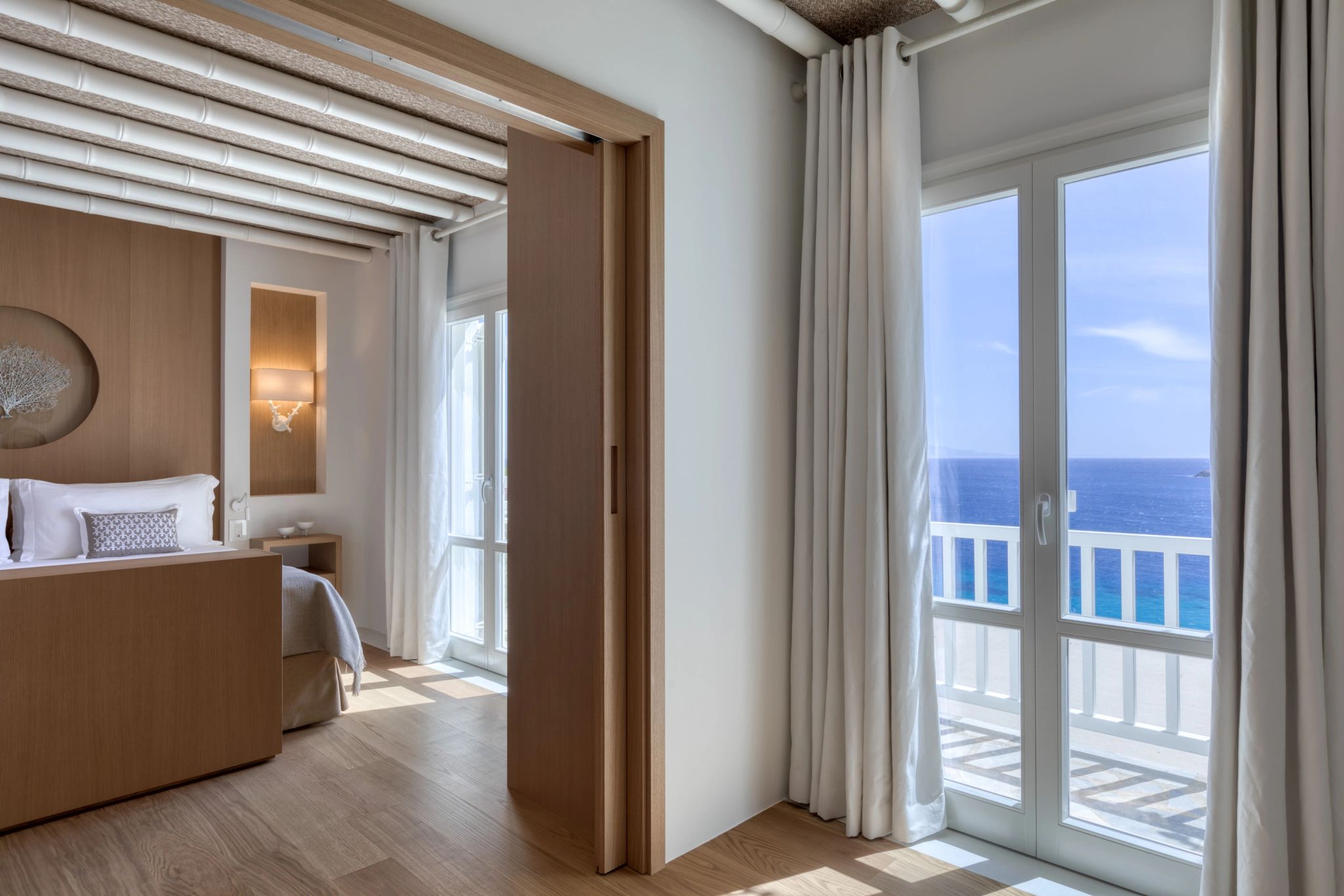 quarto vista mar - cama king - decoraçao moderna