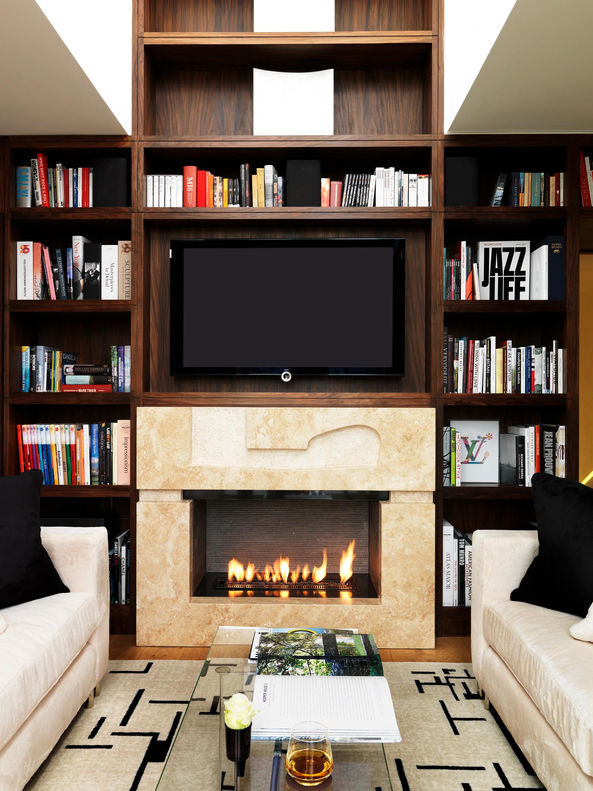 sala de estar - sala com lareira - sala aconchegante - espaço para leitura 